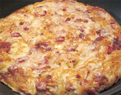 Πατάτες στο τηγάνι με τυρί και μπέικον